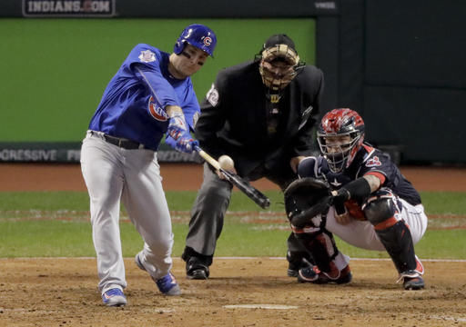 Chicago Cubs' Anthony Rizzo hita two run home rum against the Cleveland Indians during the ninth inning of Game 6 of the Major League Baseball World Series Tuesday Nov. 1 in Cleveland.