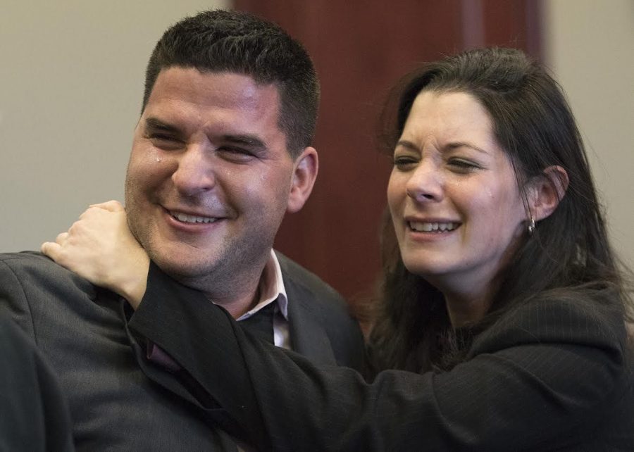 Andrew Rifkin (left) cries tears of joy with twin sister Ashley Rifkin after hearing the verdict of 'not guilty.'