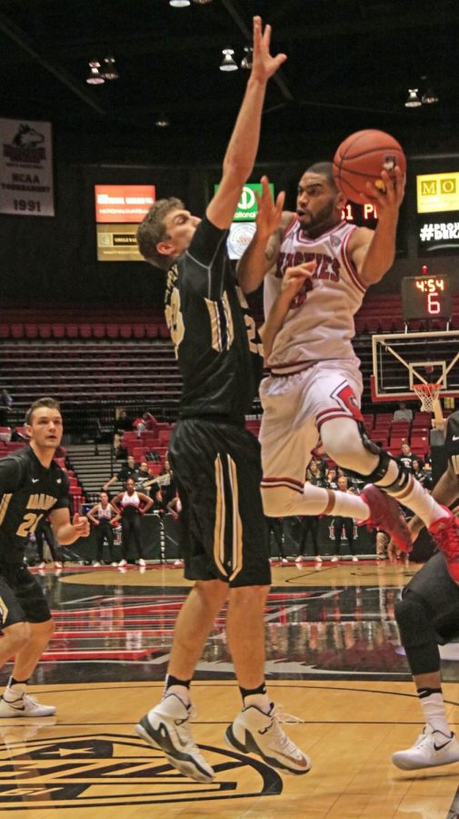 Senior guard Dontel Highsmith drives to the hoop in a Nov. 16 game against Idaho University. Highsmith finished Saturday’s game with 12 points and 71 percent shooting. 
