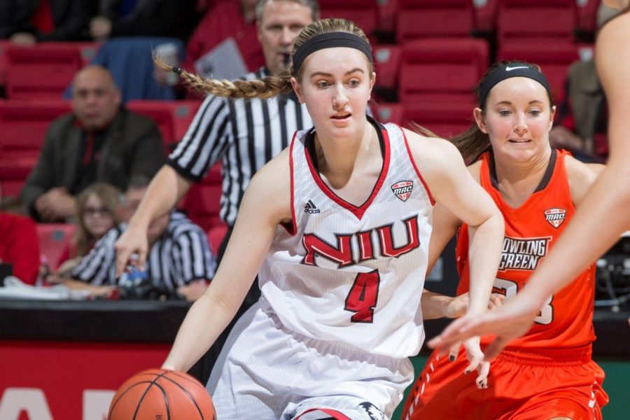Courtney Woods, women’s basketball sophomore guard and forward, leads the team to victory in a Jan. 4 game against Bowling Green State University. NIU defeated Bowling Green 89-76 and is 5-0 in Mid-American Conference play. 