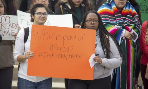 Demonstrators march to represent a