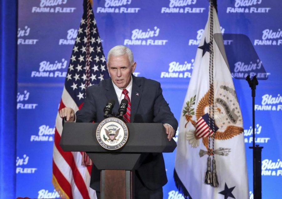 Vice President Mike Pence delivers remarks following a meeting with area business  leaders Friday in Janesville, Wis. 