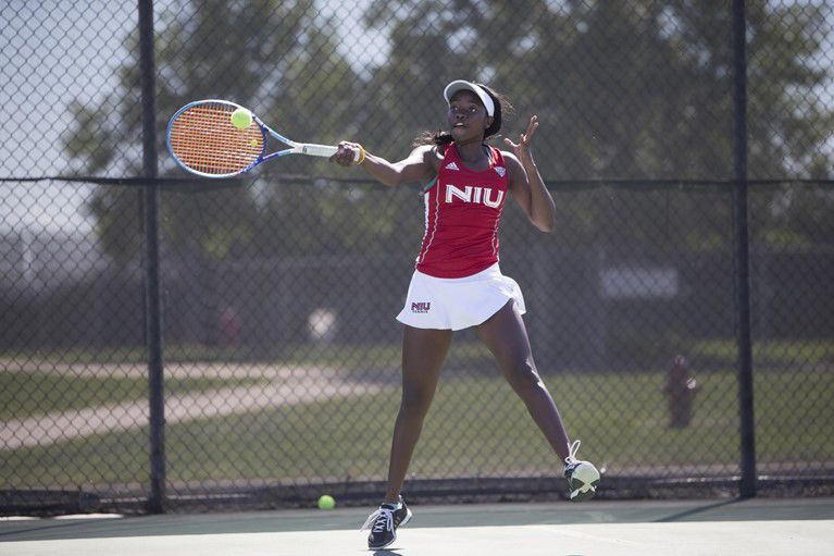 Senior Pauline Chawafambira volleys on the West tennis courts at NIU. Chawafambira lost her final home match (6-2, 6-1) Friday in Rockford.