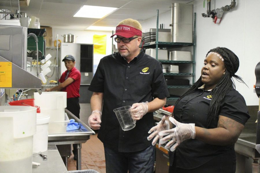 Mike Roper (left) was disguised and placed among some of his employees for an episode of Undercover Boss featuring Taco Bueno.
