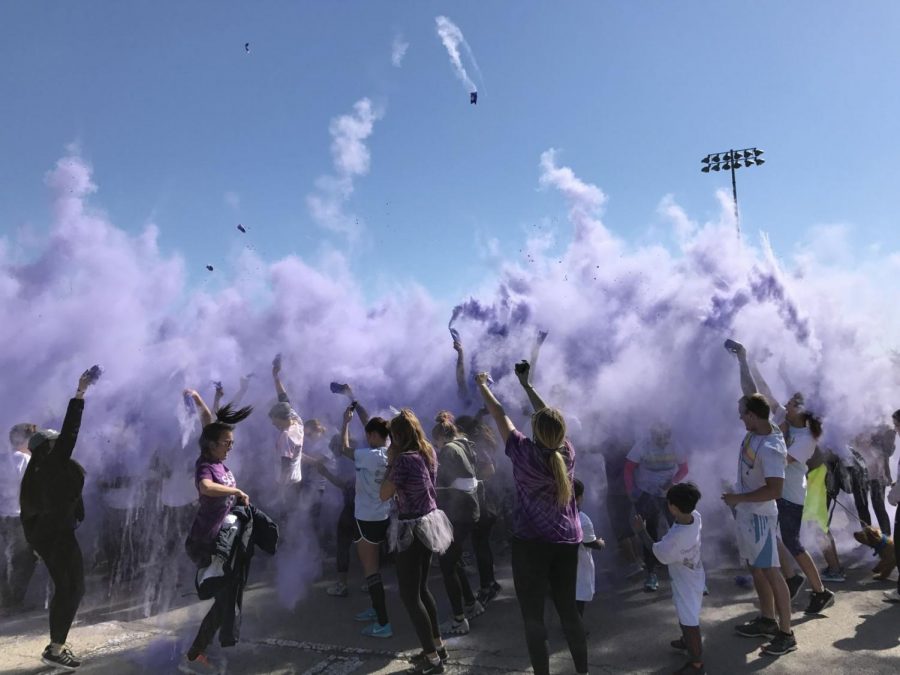 The Sigma Kappa Color Run painted runners a rainbow of colors filling the air with colored powder.