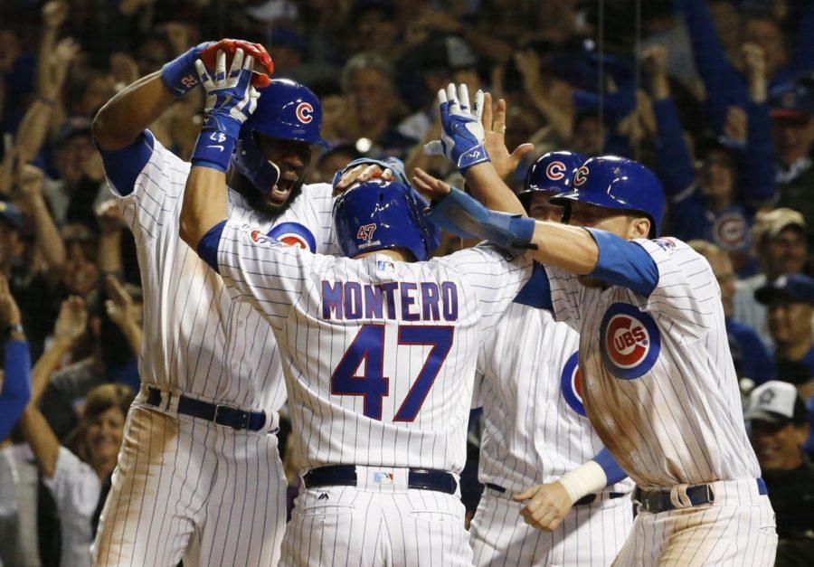 Chicago+Cubs+Miguel+Montero+%2847%29+celebrates+a+grand+slam+during+the+eighth+inning+of+Game+1+of+the+National+League+baseball+championship+series+against+the+Los+Angeles+Dodgers+Saturday%2C+Oct.+15%2C+2016%2C+in+Chicago.+%28AP+Photo%2FNam+Y.+Huh%29