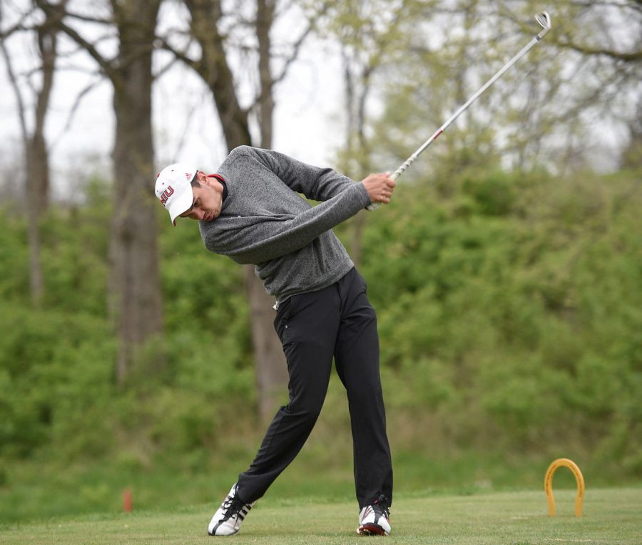 Junior Thomas DeMarco hits a shot during the Northern Intercollegiate Monday. The Huskies finished sixth place overall. 