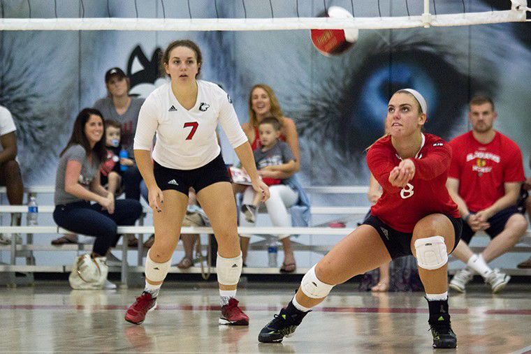 Senior outside hitter Taylor Krage (right) hits the ball Sept. 16, 2016 against the University of Tennessee. The Huskies went 0-3 Friday and Saturday at the Oregon Invitational.