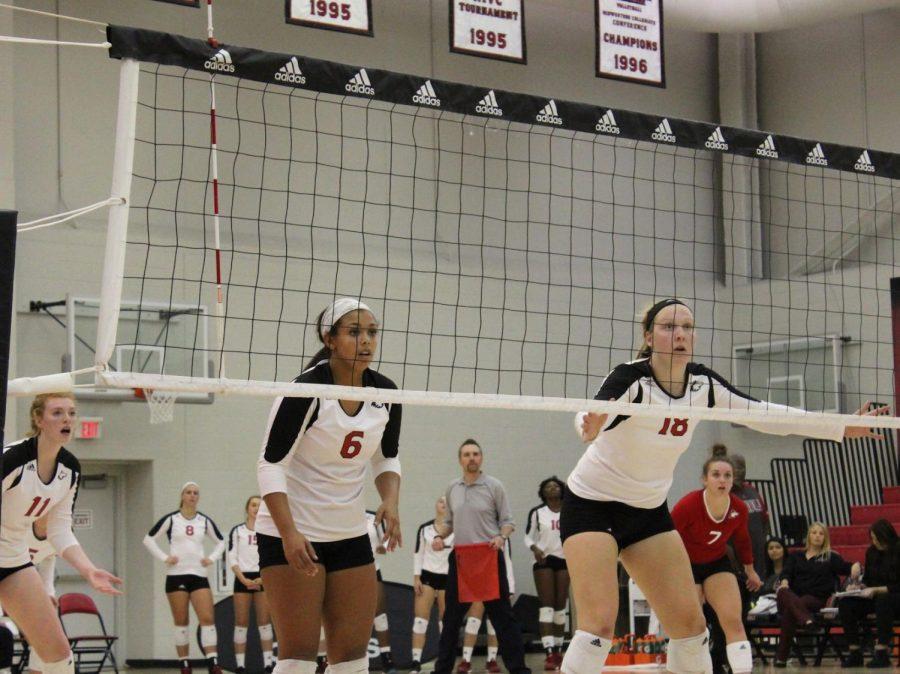 Senior setter Chandler Kinley (left) and junior middle blocker Meg Wolowicz get in position in their Sept. 12 home game against Illinois State. The Huskies lost in five sets Saturday to Bowling Green in Bowling Green, Ohio.