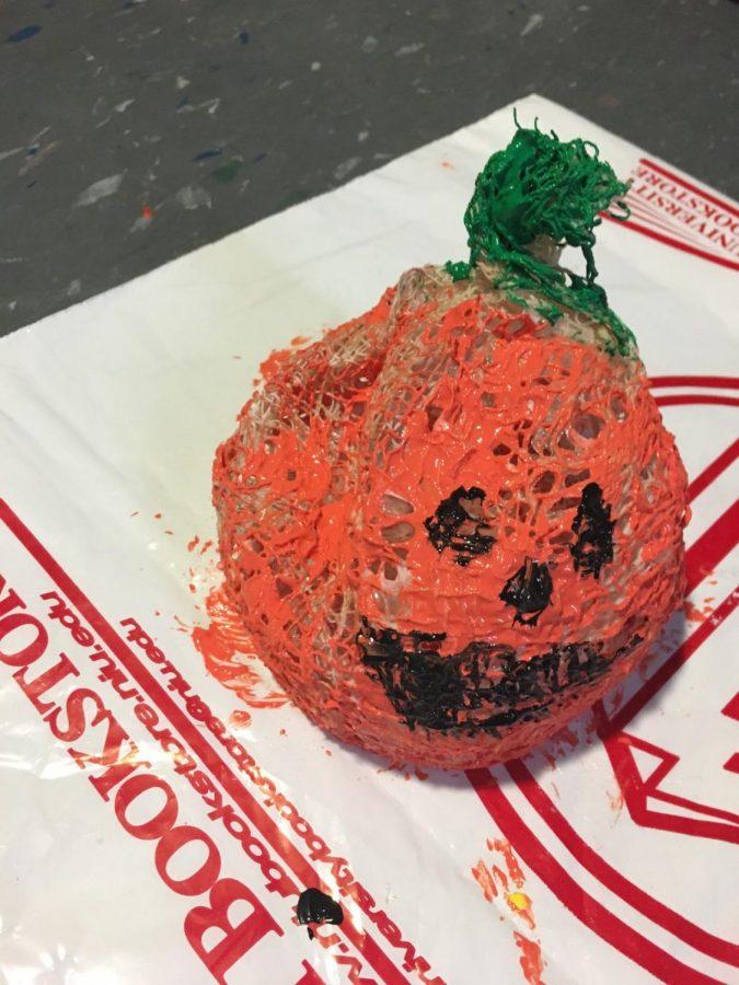 Once completed, this mesh pumpkin will add a cute touch to any living space this Halloween.