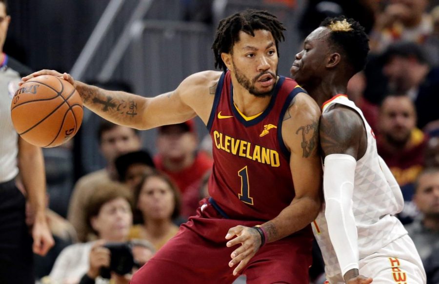 Cleveland Cavaliers guard Derrick Rose dribbles against Atlanta Hawks guard Dennis Schroder in their Nov. 5 game. Rose has played in seven of 19 games this season. 