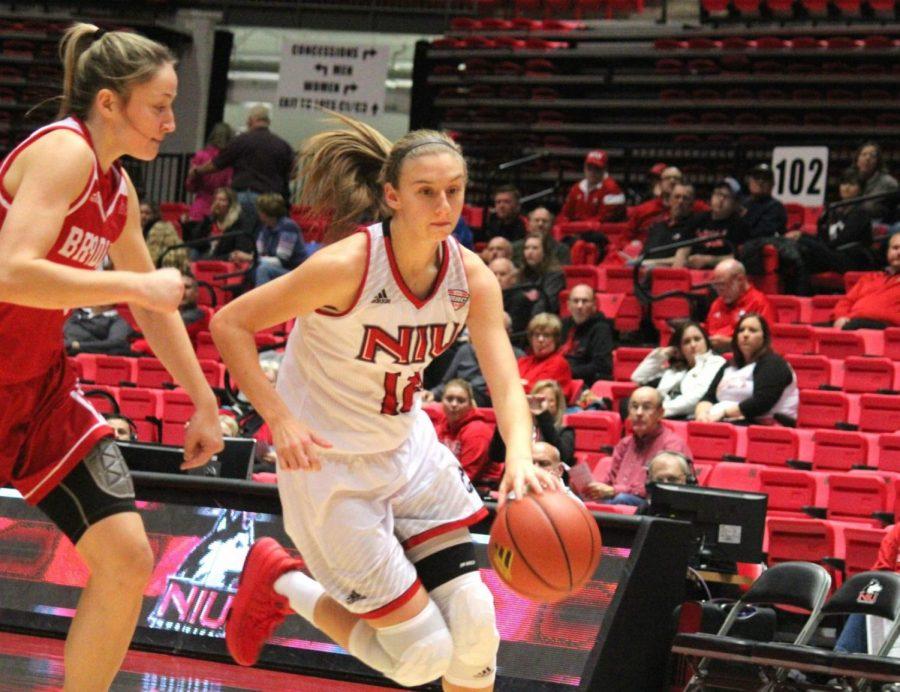 Freshman forward Riley Blackwell dribbles past her defender in the Huskies’ 76-52 home win Nov. 29 against Bradley. Blackwell was one of three freshmen added to the roster this season.  