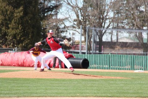 Freshman pitcher Michael Lasiewicz throws a pitch in the Huskies’ 9-5 home win Sunday against Central Michigan. Lasiewicz threw five innings and gave up five hits and four walks.