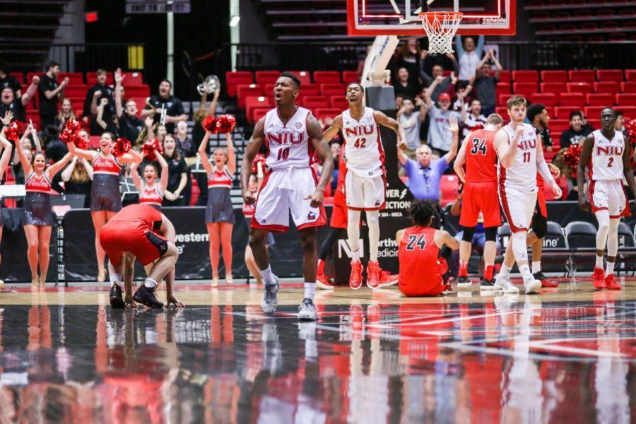 Sophomore guard Eugene German celebrates the game-winning basket in the Huskies 66-65 home win over Ball State Friday. German finished with a team-high 25 points.  