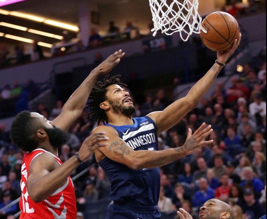 Minnesota Timberwolves guard Derrick Rose shoots a layup in the Timberwolves’ 129-120 home loss March 18 over the Houston Rockets.