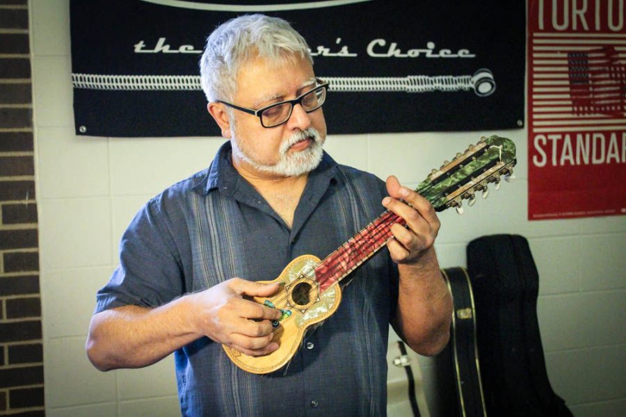 Fareed Haque playing Charango in his office at the NIU Music Building on Tuesday 5/1