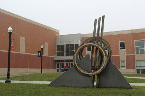 The outside of the Stevens Building, located across from Founders Memorial Library in front of the visitor parking lot.