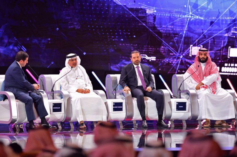 In this photo released by Saudi Press Agency, SPA, Saudi Crown Prince, Mohammed bin Salman, right, Lebanese Prime Minister, Saad Hariri, second right, and Bahrain's Crown Prince Salman bin Hamad Al Khalifa, second left, attend the Future Investment Initiative conference, in Riyadh, Saudi Arabia, Wednesday, Oct. 24, 2018. Salman addressed the summit on Wednesday, his first such comments since the killing earlier this month of journalist Jamal Khashoggi at the Saudi Consulate in Istanbul. (Saudi Press Agency via AP)