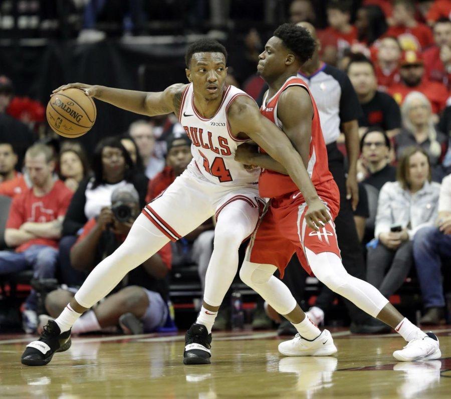 Chicago Bulls Wendell Carter Jr. (34) works for position as Houston Rockets Danuel House Jr. defends during the first half of an NBA basketball game Saturday, Dec. 1, 2018, in Houston. (AP Photo/David J. Phillip)