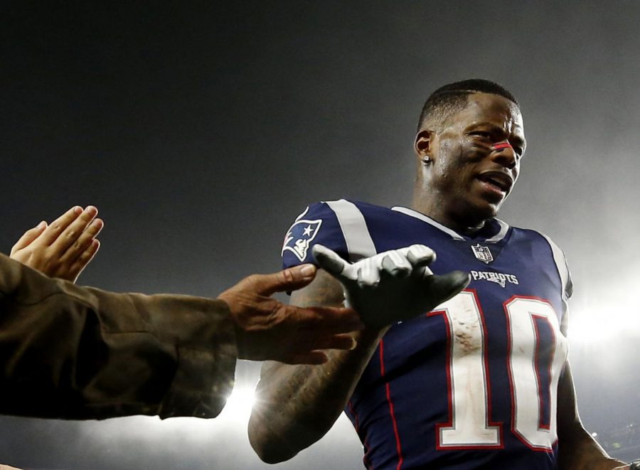 FILE - In this Dec. 2, 2018, file photo, New England Patriots wide receiver Josh Gordon is congratulated after an NFL football game against the Minnesota Vikings at Gillette Stadium, in Foxborough, Mass. Patriots receiver Josh Gordon says he is stepping away from football in order to focus on his mental health. In a statement posted on Twitter on Thursday morning, Dec. 20, 2018, Gordon said his decision was spurred by him feeling recently that he could have a better grasp on things mentally. He thanked the Patriots for their support and vowed to work his way back. (AP Photo/Winslow Townson, File)