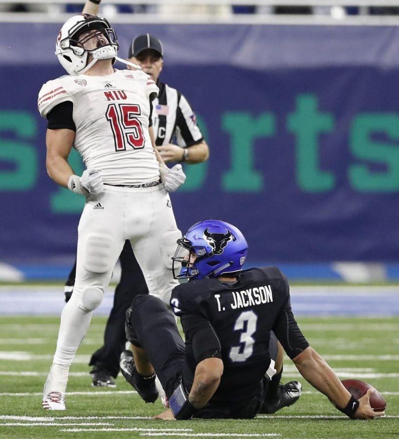 FILE - In this Nov. 30, 2018, file photo, Northern Illinois defensive end Sutton Smith (15) reacts after sacking Buffalo quarterback Tyree Jackson (3) during the second half of the Mid-American Conference championship game, in Detroit. Smith was named to the 2018 AP All-America NCAA college football team, Monday, Dec. 10, 2018.(AP Photo/Carlos Osorio, File)