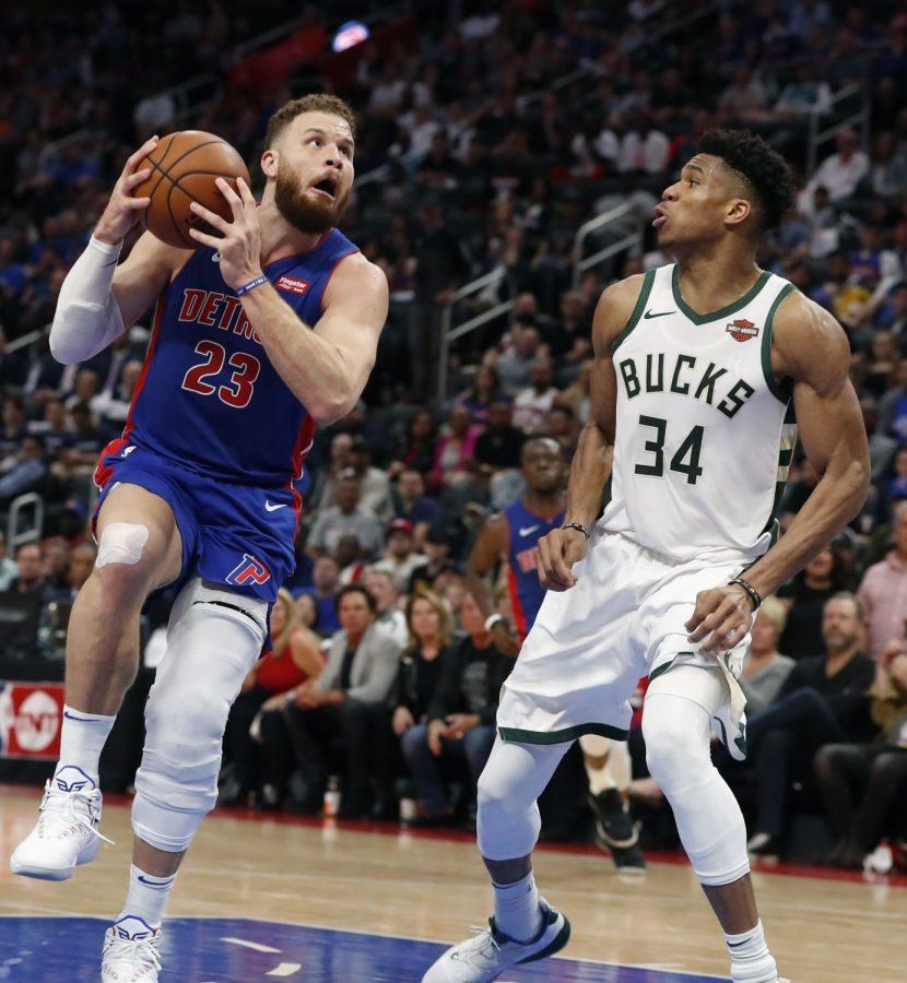 Detroit Pistons forward Blake Griffin (23) attempts a layup as Milwaukee Bucks forward Giannis Antetokounmpo (34) defends during the second half of Game 4 of a first-round NBA basketball playoff series, Monday, April 22, 2019, in Detroit.