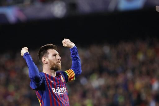 Barcelona's Lionel Messi celebrates after scoring his side's third goal during the Champions League semifinal, first leg, soccer match between FC Barcelona and Liverpool at the Camp Nou stadium in Barcelona, Spain, Wednesday, May 1, 2019. (AP Photo/Emilio Morenatti)