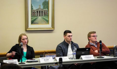 Cassandra Kamp, Deputy Speaker of the Senate, (left), Brandon Lesnicki, Election Commissioner, and Ian Pearson, Speaker-elect, listen to prospective executive cabinet members at the Saturday night Senate meeting.