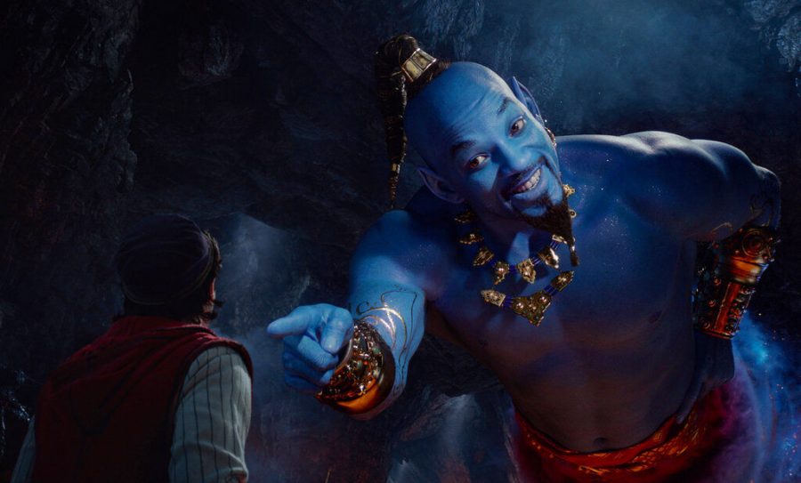 Will Smith (right) stars as the iconic Genie in the live-action remake of Aladdin which stars Mena Massoud (right) as the titular thief.