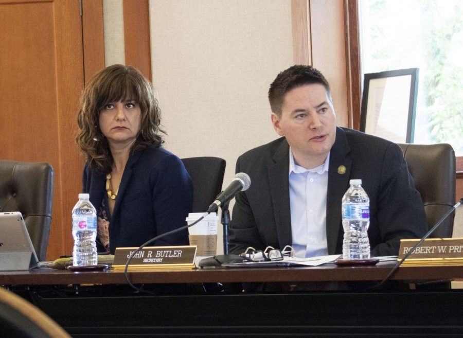 On June 13, Trustees Veronica Herrero (left) and John Butler discuss the engineering doctoral programs