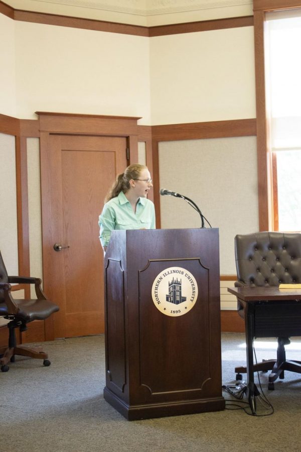 Communication graduate student Konstanze Fowler addresses the Board of Trustees Aug. 15.
