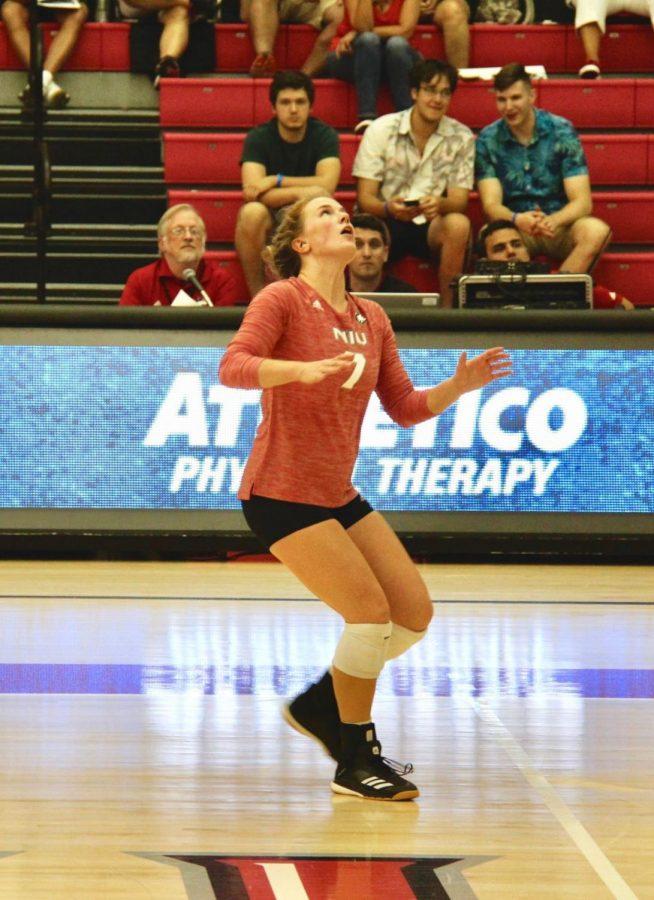 Sophomore setter Grace Balensiefer positions her feet for a set during warmups Aug. 30 against Southern Illinois University - Edwardsville at Victor E. Court.