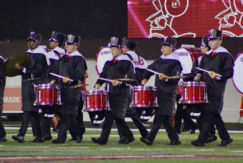 The Huskie Marching Band performs at halftime of the NIU/ISU Football Game on Aug. 31 at Huskie Stadium.