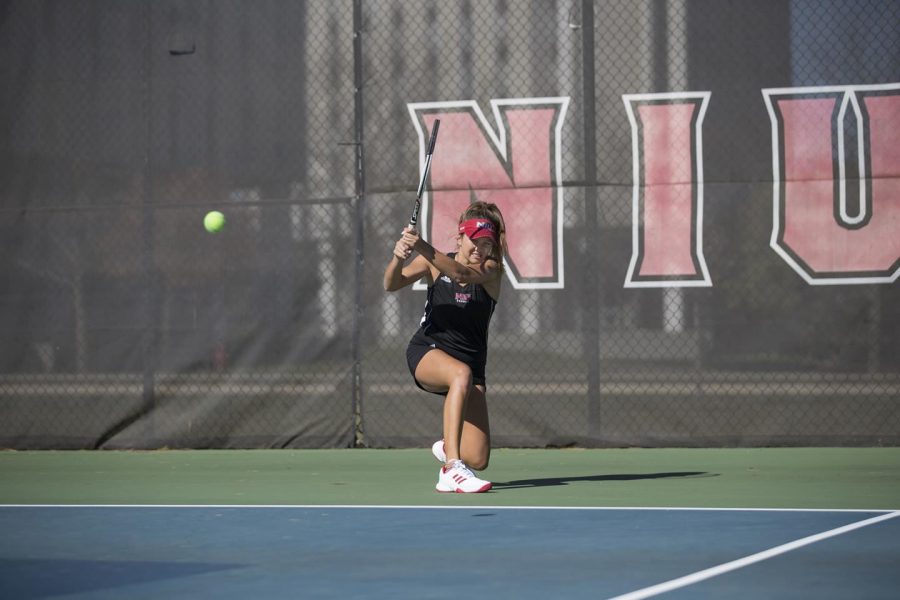 Sophomore Fernanda Naves follows though on her swing during a 2018 match.