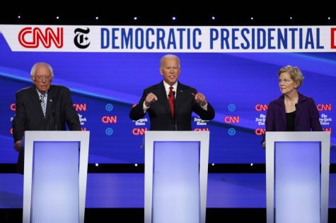 Democratic presidential candidates Sen. Bernie Sanders (from left), former Vice President Joe Biden and Sen. Elizabeth Warren participate Tuesday in a Democratic presidential primary debate in Ohio.