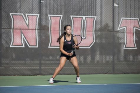 Junior Lara Slisko prepares for an opponents swing at the NIU Tennis Courts.