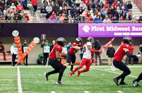 Marcus Jones, redshirt senior running back, returns a kick Oct. 5 against Ball State University during an eventual 27-20 loss at Huskie Stadium.