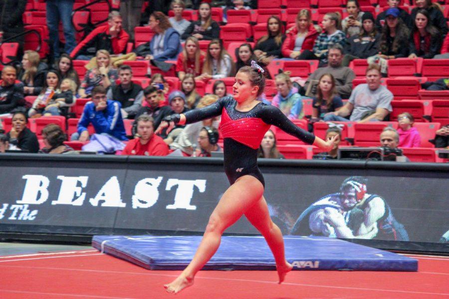Senior Amanda Bartemio performs a routine Feb. 27 during The Beauty and The Beast Meet held at the Convocation Center.