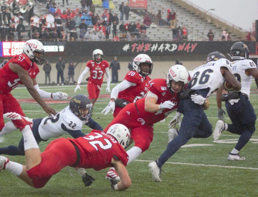 Corey Lersch, redshirt junior tight end, makes a tackle on special teams Oct. 26 during NIUs 49-0 victory against the University of Akron at Huskie Stadium.