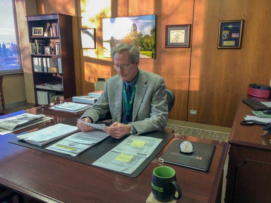 In this Jan. 14 photo, DeKalb City Manager Bill Nicklas sits at his desk and reviews documents after stepping into the position.