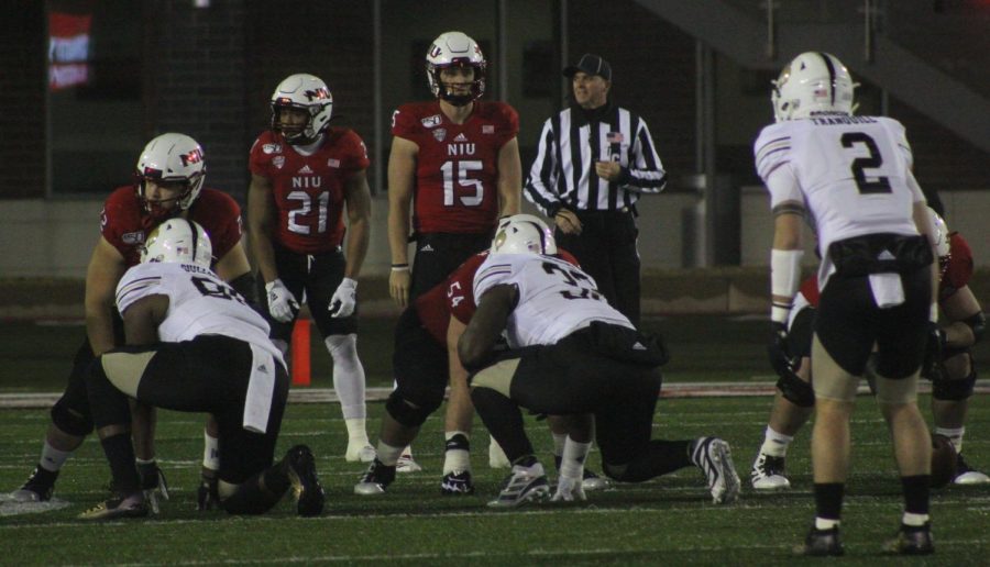 Huskie offense prepares for its next play Nov. 27 during a home game against Western Michigan University at Huskie Stadium.