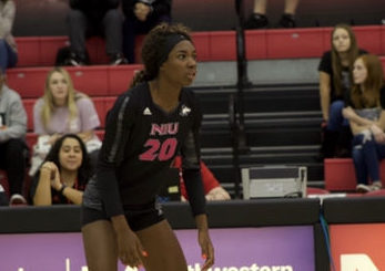 Senior middle blocker Kennedy Wallace and Junior setter Grace Balensiefer await an opponent's attack Oct. 25, 2019. 