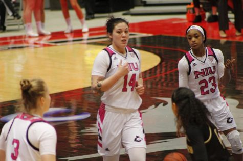 Senior forward Mikayla Brandon (from the left) and Myia Starks get back on defense Feb. 15 during NIU’s 68-65 loss to the Western Michigan University Broncos at the Convocation Center.