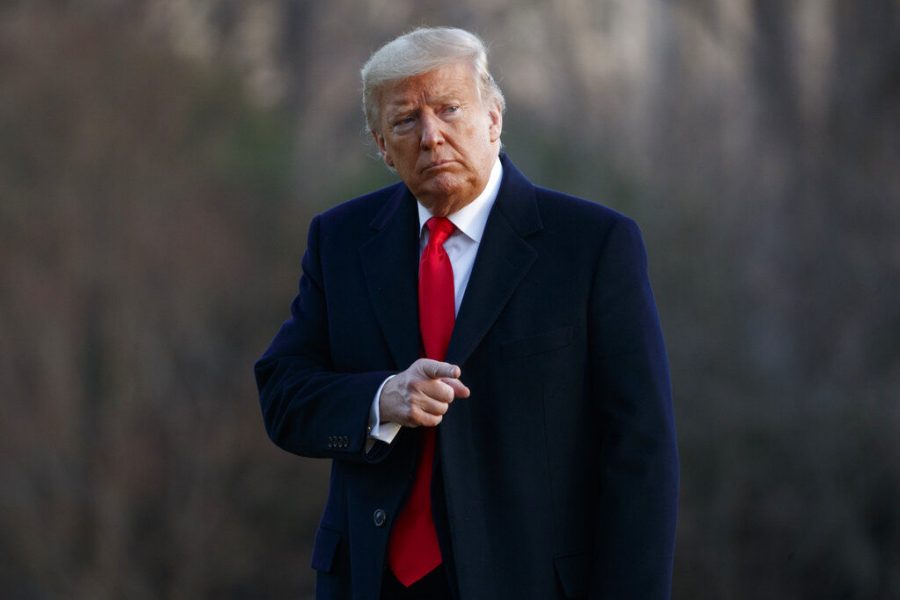 President Donald Trump points to the media as he arrives at the White House in Washington, Saturday, Feb. 29, 2020, on Marine One as he returns from speaking at the Conservative Political Action Conference.