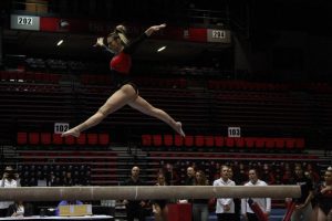 Junior Mia Lord performs a beam rountine March 1 during NIUs meet against Southeast Missouri State University at the Convocation Center.