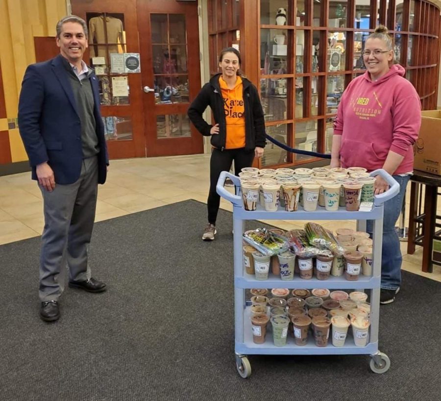 Kishwaukee Hospital President Jay Anderson (from left), Kates Place owner Kate Huftalin and Wired Nutrition owner Kimberly Zepeda during one of the deliveries of shakes to Kishwaukee Hospital.