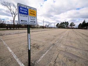 The parking lot behind Gabel Hall sits empty Monday. During a typical semester, Lot 38 is usually full, but due to the NIUs campus shutting down, most of the parking lots are barren.