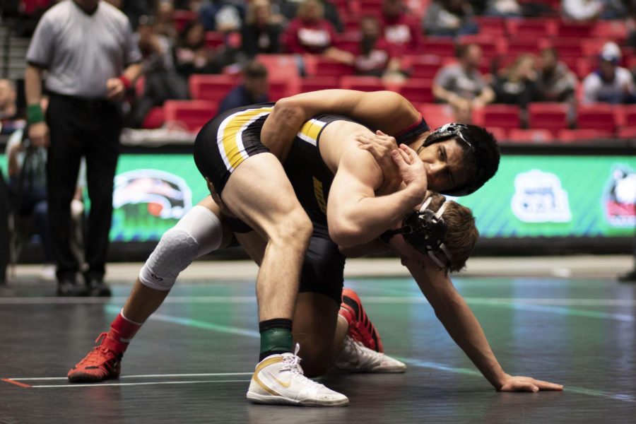 Then+redshirt+first-year+Izzak+Olejnik+grapples+with+University+of+Missouri+redshirt+first-year+Peyton+Mocco+March+7%2C+2020+during+his+4-3+win+in+the+2020+MAC+Championship+semifinals+at+the+Convocation+Center.