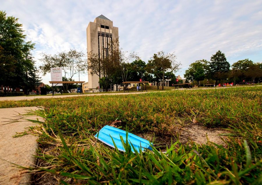 A mask on the ground of NIUs campus. As of Feb. 28, students and faculty are no longer required to wear masks indoors. 