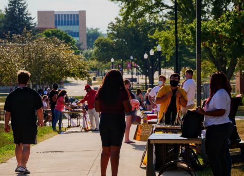 Student organizations wait at tables to get students involved with them at NIUs involvement fair in August 2020. 